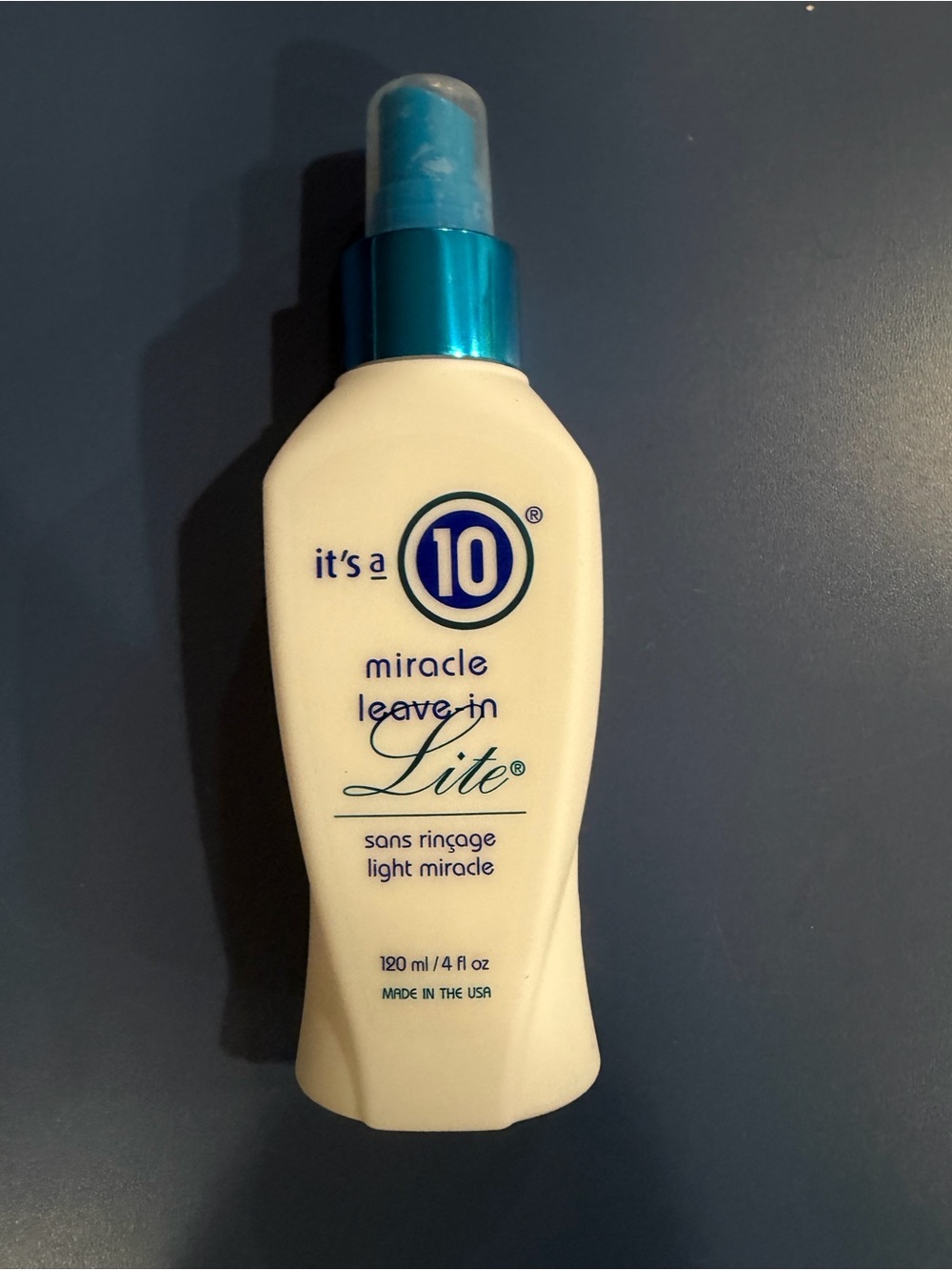 It's a 10 Miracle Leave-In Lite Spray - White